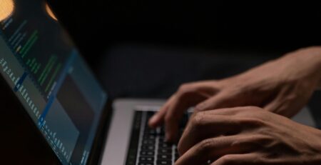 person-using-silver-and-black-laptop-computer
